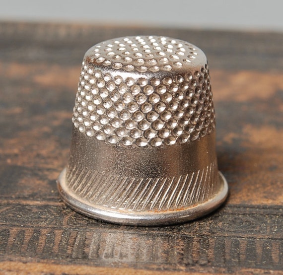 Vintage metal thimble.
