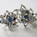 SALE 25 PERCENT OFF Vintage 50s Mid Century Hollywood Regency Silvertone Topaz Sapphire Blue Rhinestone Leaf Earrings