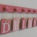 Custom Wall Plaques - Name Wall Hanging - Baby Girl Nursery Room Decor set with 7 Wooden Pegs Pink - Personalized for DELANEY