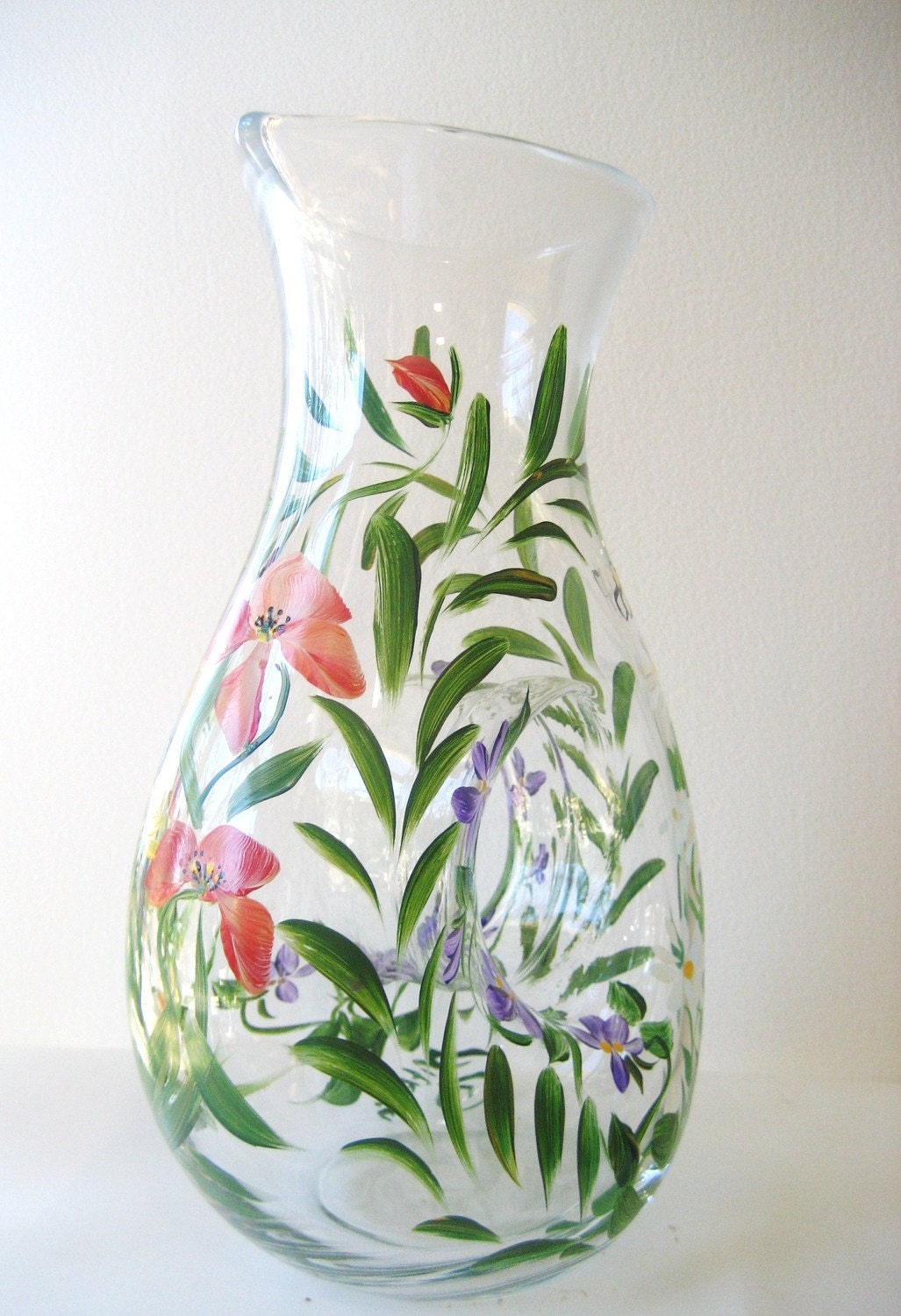 Hand painted glass pitcher with wildflower and fern.