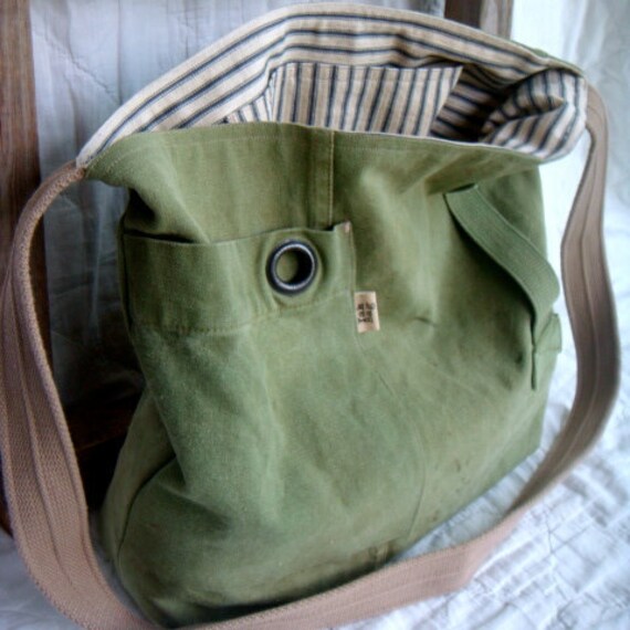 Grommet reconstructed vintage military duffle messenger bag