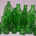 c1940s-50s Group of 19 Emrald Green Glass Medicine and Food Bottles and Jars