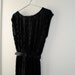 a vintage pleated accordion dress. black and belted. size xsmall