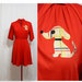 1970s vermilion red raglan sleeve minidress with applique Dachshund puppy, size medium or small