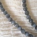 Faceted Grey Cats Eye Bead Strand for Endless Elegance