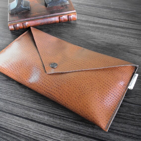 orange envelope clutch bag