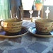 Jane Austen Pride & Prejudice Teacups and Saucers - Set of Two chocolate/toffee colored Elizabeth Bennett Quote mugs