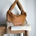 Boho Chic Hobo in Slouchy Caramel Leather and Natural Handweave. Pleated Tassels - OOAK
