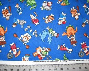 Timeless Treasures Tossed Cavemen on blue 21" X 42"