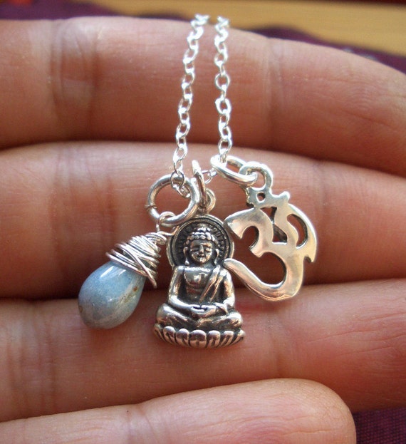 Om Buddha necklace with wrapped blue Czech glass bead