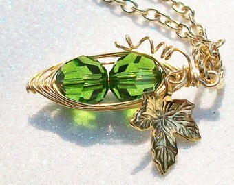 Two Peas in a Pod Green Swarovski Crystals. Gold pod with vine and leaf. Personalized best friends brides bridesmaids gift