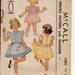 McCall 1383 Girls 1940s Tucked Full Skirt Dress Pattern Puff Sleeve Embroidery and Ribbon Trim Childrens Vintage Sewing Pattern Breast 24