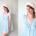 vintage 1960's powder blue sheer négligée bed jacket with rosebud trim / size s - m