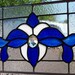 Blue and White Fleur de Lis Stained Glass Window