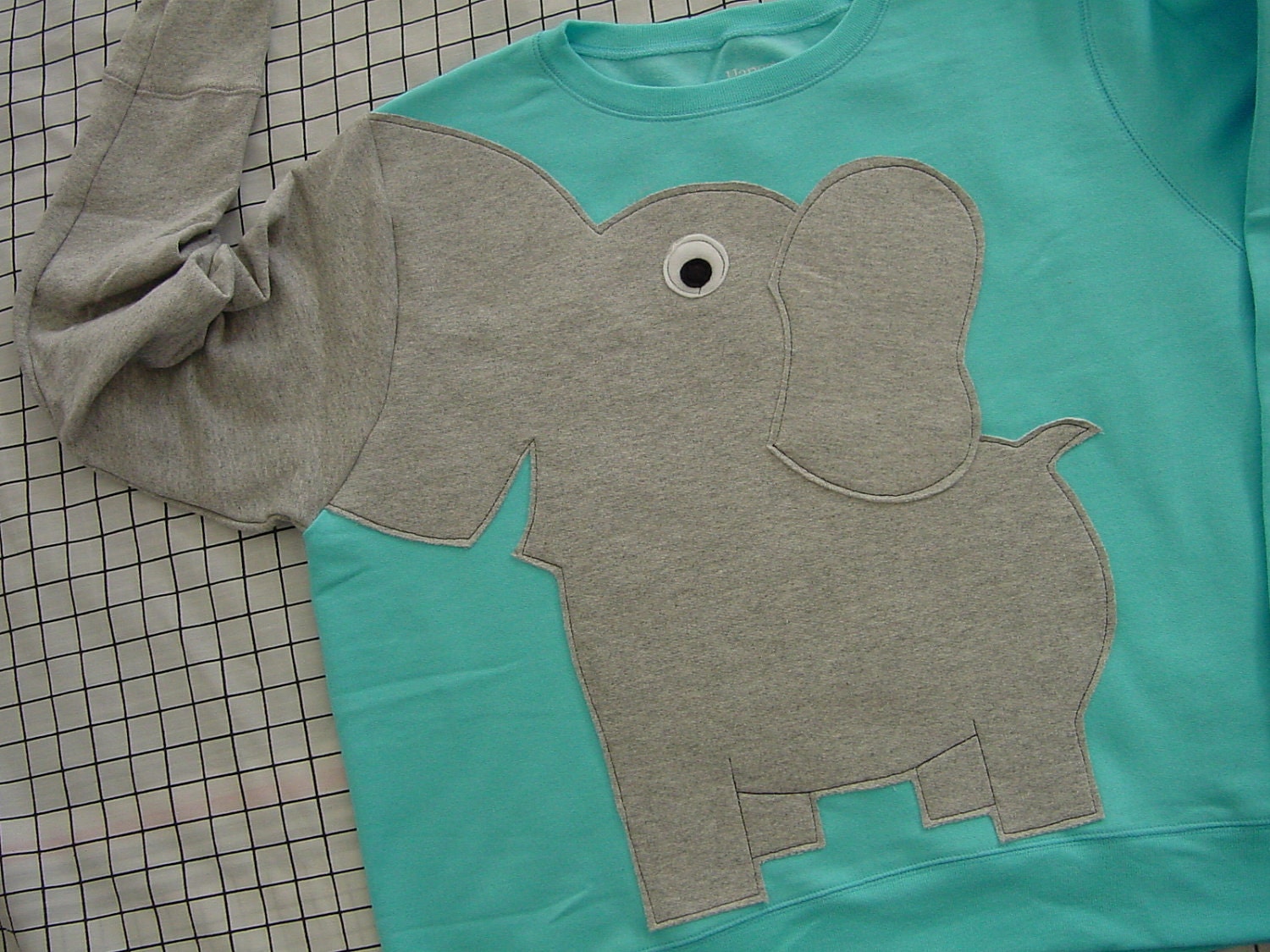 elephant trunk sleeve shirt