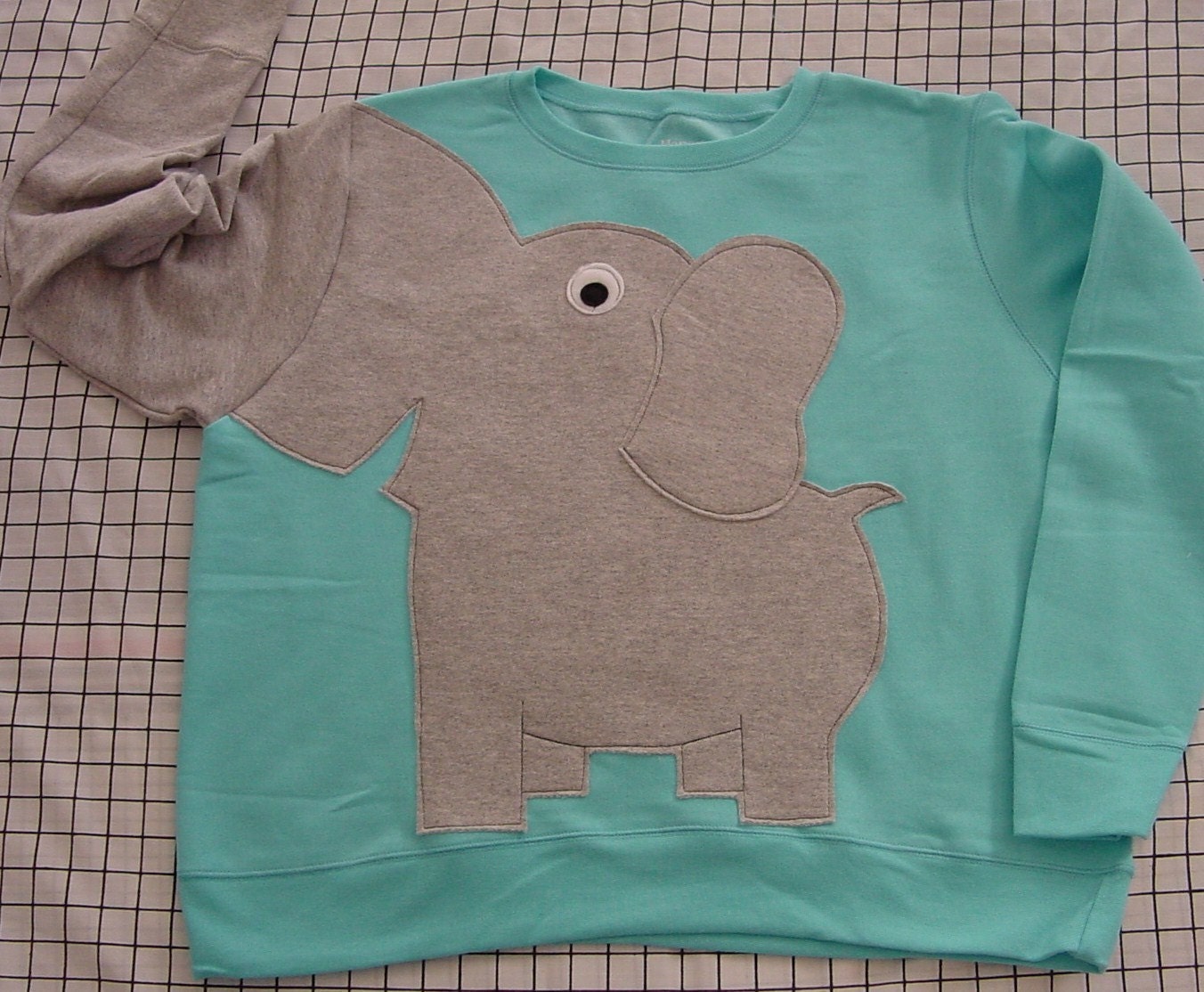 elephant trunk sleeve shirt