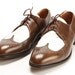 brown and white wingtip