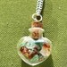 Miscellaneous beach glass bottle pendant
