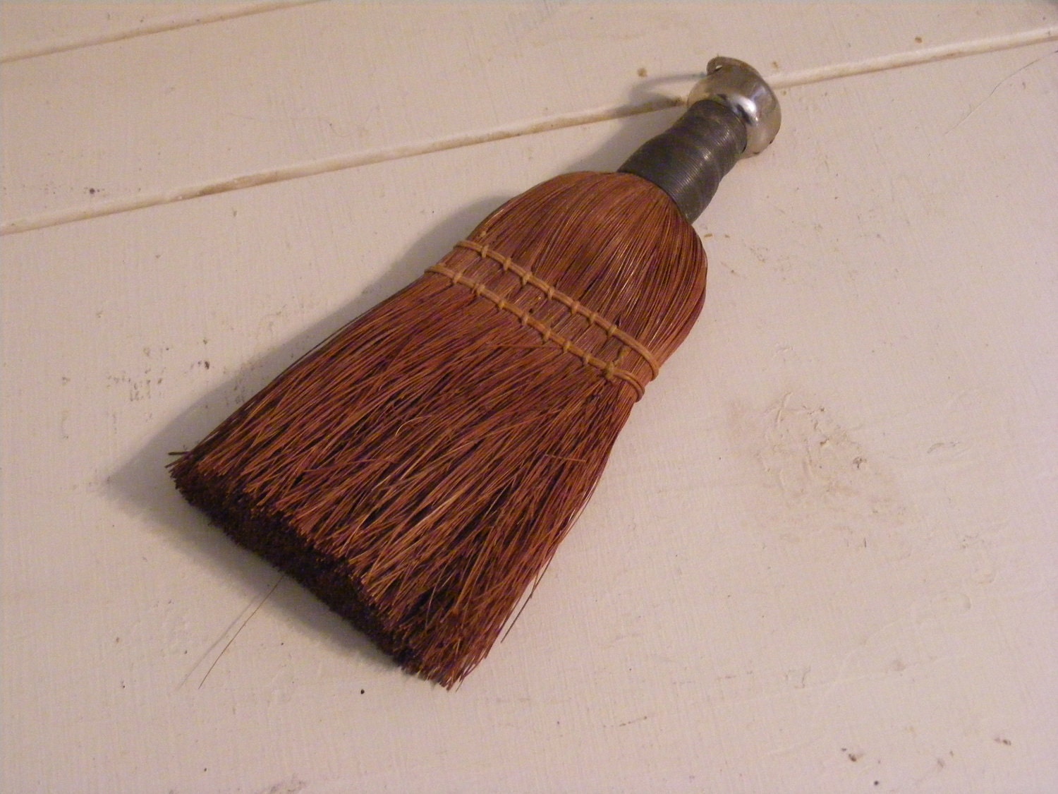 whisk hand broom
