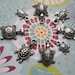 Collection of 8 turtle charms - C553