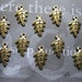 10 Leaf Charms in dark gold tone - C682