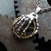Steampunk Pendant Hand "The Machine" Robotic Skeleton Hand Necklace Watch Stem Metal Sculpture A Mechanical Mind Skeletal Terminator