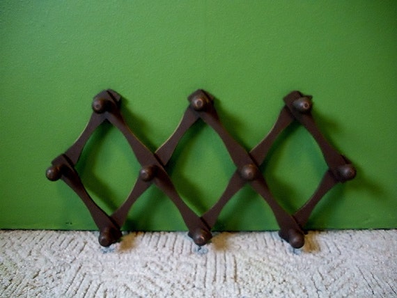 Folding hanging accordion style wood peg rack coat wall rack