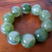 75% OFF SALE - vintage mod green beaded stretch bracelet