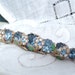 Vintage Blue Rhinestone Brooch With Enameled Champlevé Style White Flowers Green Leaves Gold Tone Pin Elegant 1940s Jewelry