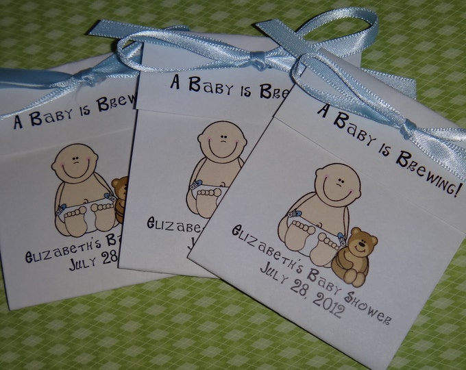 Super Cute Baby Boy with his teddy bear tea bag party favor for a Baby Shower or Baby Sprinkle
