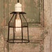 Industrial Light with Vintage Porcelain Socket and Black Cage hung by Reproduction Cotton Twist Wire