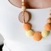Orange and Yellow - 100% Organic Cotton - Teething Necklace for Mom to Wear with an oak wood button