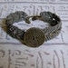 Micro macrame friendship bracelet. Karma bracelet in gray and matte metallic khaki,