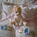 Vintage Baby Sitting on Booties planter, storage, baby, nursery