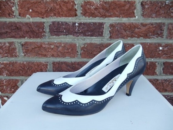 navy blue and white pumps