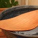 Sycamore wood wooden spatula spoon for mixing and stirring.