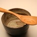 Small wooden serving spoon kitchen utensil of salvaged Plum wood