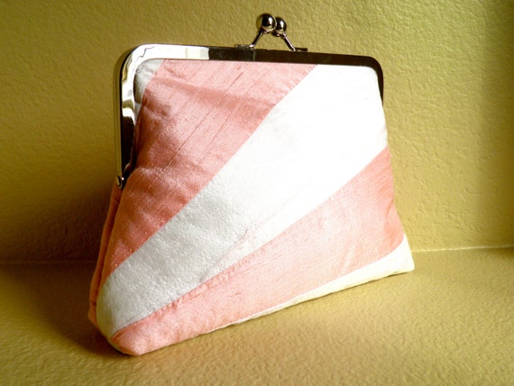 pink and white clutch