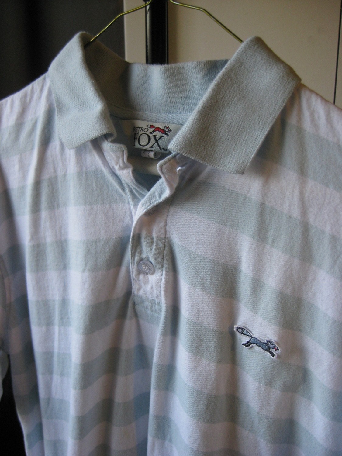 polo shirt with a fox on it