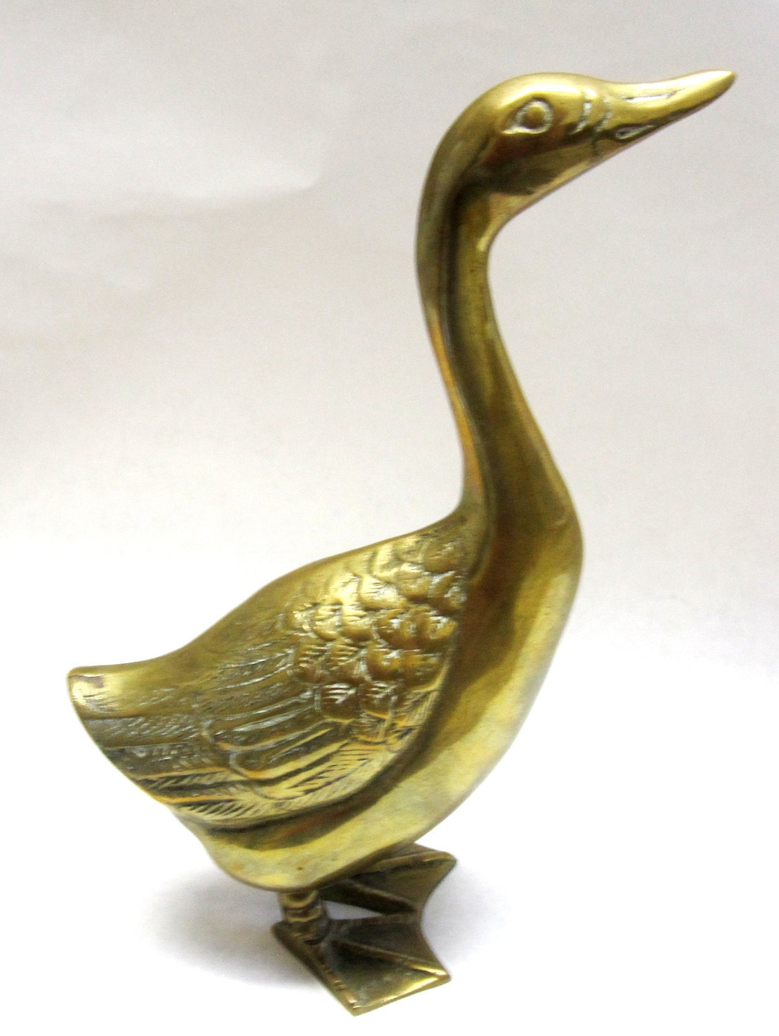 brass goose figurine