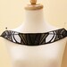 Silver , Black pleather leather and grey satin embroidery applique.