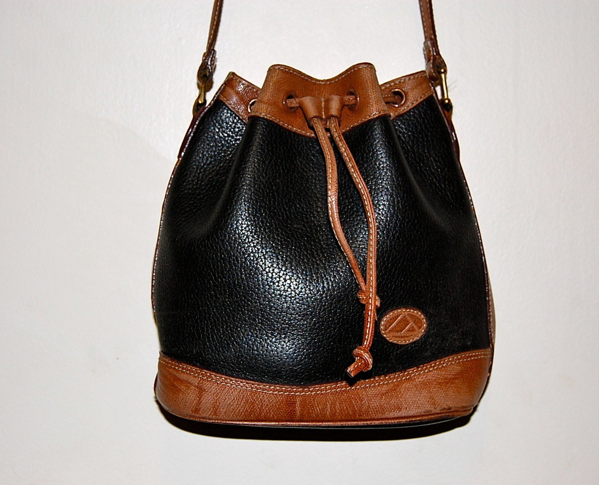 Black And Brown Leather Drawstring Bucket Bag By Bullandbarter