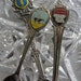 Three collectible vintage state spoons