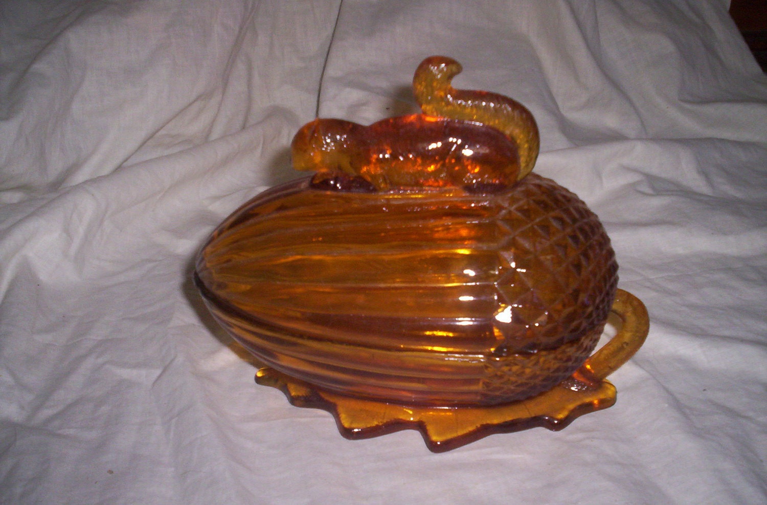 vintage glass squirrel on nut acorn candy dish amber