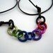 Adjustable Rainbow Rings and Leather Pride Necklace