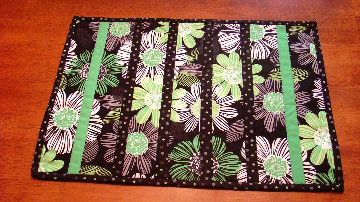 Four quilted placemats