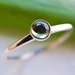 Tiny peridot and sterling silver stacking ring