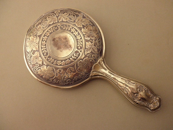 antique german silver hand mirror with embossing beveled