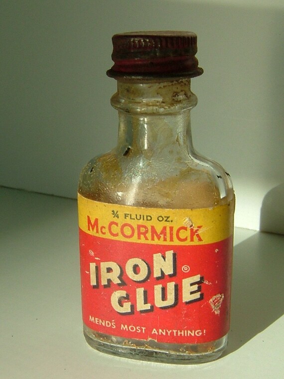 Antique McCormick Iron Glue Bottle