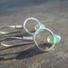 Circles of light hand forged sterling silver and Czech glass artisan earrings